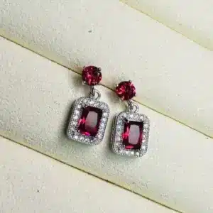 Silver Studded Eyeing Ruby Colored Stone